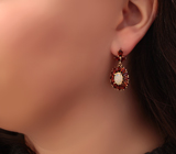 Серебряные серьги с кристаллическим эфиопскими опалами и альмандинами гранатами Серебро 925