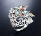 Серебряное кольцо с голубыми топазами лазерной огранки, цитрином и перидотом
