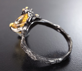 Серебряное кольцо с резным цитрином и родолитами