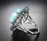 Серебряное кольцо с ларимаром 8,28 карата, насыщенно-синими топазами и бесцветными сапфирами бриллиантовой огранки
