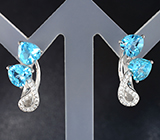 Романтичные серебряные серьги с голубыми топазами