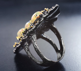 Серебряное кольцо с кристаллическими эфиопскими опалами, сапфирами и цитрином