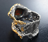Серебряное кольцо с кристаллическим черным опалом 5,5 карата и цаворитом
