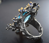 Серебряное кольцо с голубым топазом 26,33 карата и васильковыми сапфирами Серебро 925