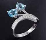 Романтичное серебряное кольцо с голубыми топазами 
