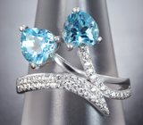 Романтичное серебряное кольцо с голубыми топазами  Серебро 925