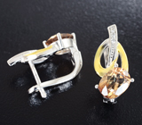 Изысканные серебряные серьги с империал топазами Серебро 925