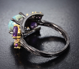 Черненое серебряное кольцо с ларимаром и аметистами