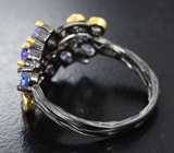 Оригинальное серебряное кольцо с танзанитами
