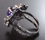 Серебряное кольцо с аметистами и топазами