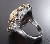 Серебряное кольцо с кристаллическим эфиопским опалом 3,5 карата, родолитами, турмалинами и красным сапфиром Серебро 925
