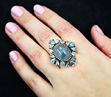 Серебряное кольцо с аквамарином и бесцветными топазами