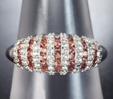 Серебряное кольцо с падпараджа сапфирами бриллиантовой огранки и бесцветными топазами