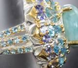 Серебряное кольцо с ларимаром, голубыми топазами и танзанитами