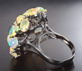 Серебряное кольцо с кристаллическими эфиопскими опалами и танзанитом