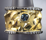Необычное серебряное кольцо с насыщенно-синим топазом