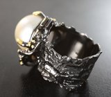 Серебряное кольцо с жемчужиной барокко и альмандинами гранатами