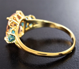 Золотое кольцо с персиковым морганитом 2,05 карата и небесно-голубыми цирконами 1,2 карата Золото