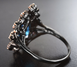 Серебряное кольцо с насыщенно-синим топазом и танзанитами Серебро 925