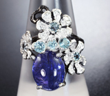 Серебряное кольцо с танзанитом и голубыми топазами