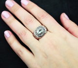 Стильное серебряное кольцо с аквамарином, родолитами и танзанитами