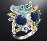 Серебряное кольцо с резным голубым топазом, синими сапфирами 4,74 карата, танзанитами и аметистами Серебро 925