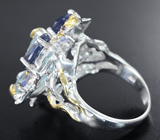Серебряное кольцо с резным голубым топазом, синими сапфирами 4,74 карата, танзанитами и аметистами
