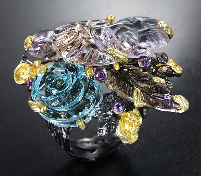 Серебряное кольцо с резными аметринами, голубым топазом и аметистами