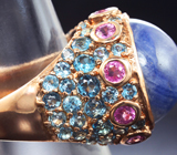 Серебряное кольцо с кабошоном корунда 29,58 карата, розовыми сапфирами и голубыми топазами