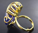 Золотое кольцо с крупным ярким танзанитом 26,72 карата и синими сапфирами Золото