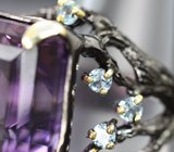 Серебряное кольцо с аметистом 32,94 карата и голубыми топазами