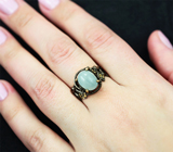 Серебряное кольцо с аквамарином 4,05 карата и голубыми топазами