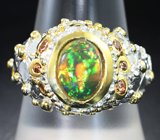 Серебряное кольцо с кристаллическим эфиопским опалом и гранатами