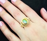 Серебряное кольцо с кристаллическим эфиопским опалом и гранатами
