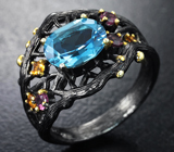 Серебряное кольцо c голубым топазом, родолитами и цитринами