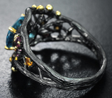 Серебряное кольцо c голубым топазом, родолитами и цитринами