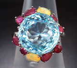 Серебряное кольцо с голубым топазом, рубинами и ограненными эфиопскими опалами