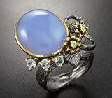 Серебряное кольцо с халцедоном, голубыми топазами и танзанитами