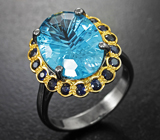 Серебряное кольцо с голубым топазом лазерной огранки 8,32 карата и синими сапфирами Серебро 925