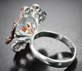 Серебряное кольцо с кристаллическим эфиопским опалом 0,76 карата и альмандинами гранатами Серебро 925