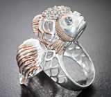 Скульптурное серебряное кольцо с танзанитами и голубыми топазами