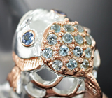 Скульптурное серебряное кольцо с танзанитами и голубыми топазами