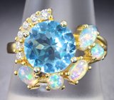 Роскошное серебряное кольцо с голубым топазом и кристаллическими эфиопскими опалами