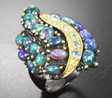 Серебряное кольцо с кристаллическими черными опалами и голубыми топазами
