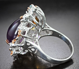Серебряное кольцо с аметистом, цитрином, альмандином гранатом и голубыми топазами