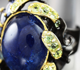 Серебряное кольцо с кабошоном танзанита 18,98 карата, ограненными танзанитами, голубыми топазами и перидотами Серебро 925