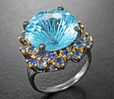 Серебряное кольцо с голубым топазом лазерной огранки 12,12 карата и синими сапфирами Серебро 925