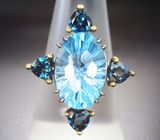 Серебряное кольцо с голубым топазом лазерной огранки и насыщенно-синими топазами 11,07 карата Серебро 925