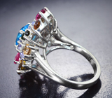 Праздничное серебряное кольцо с голубым топазом, танзанитами и разноцветными турмалинами