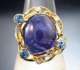 Золотое кольцо с крупным насыщенным танзанитом 19,26 карата, синими сапфирами и бриллиантами